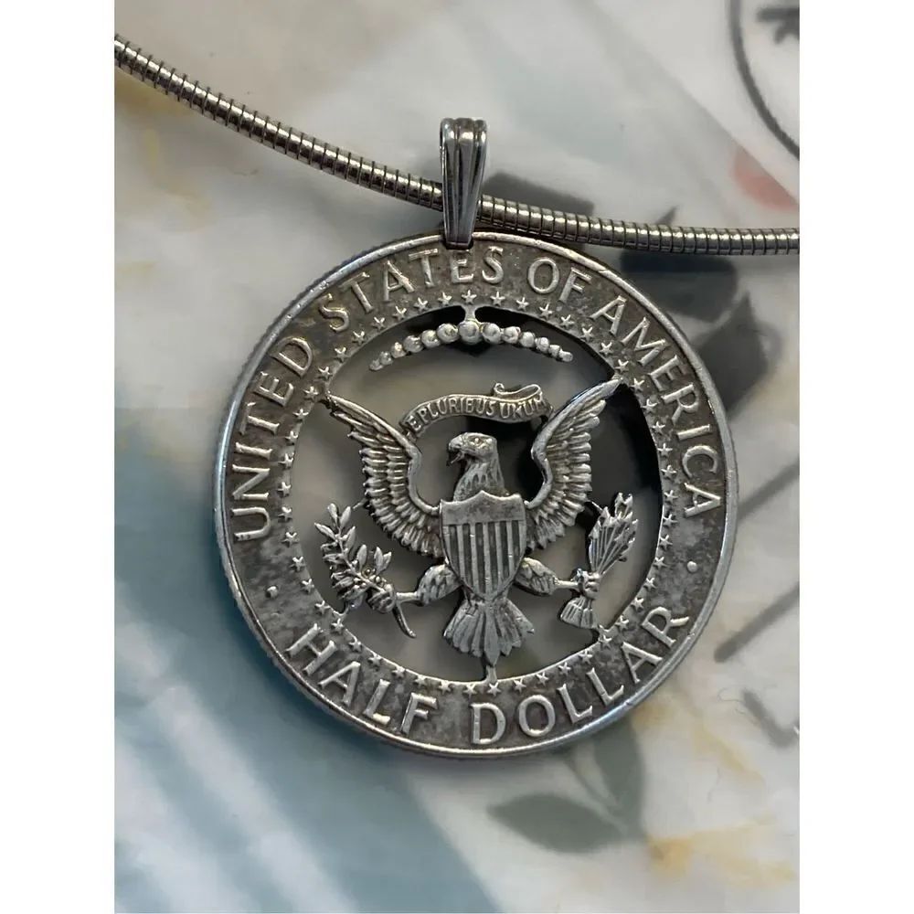 Silver half dollar carved pendant necklace